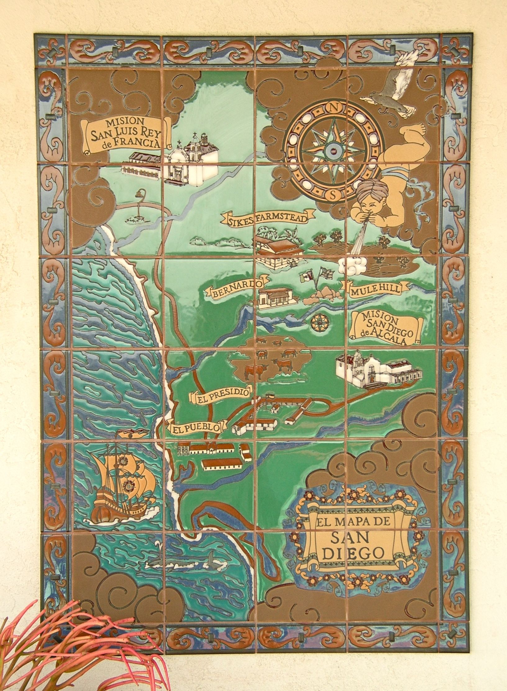 custom_designed_and_hand_painted_tile_mural_compliments_counter_3